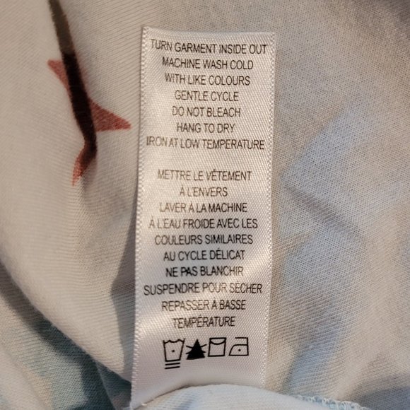 Large Ricki's Hi-Lo Star Patterned V-Neck Shirt - Picture 5 of 8